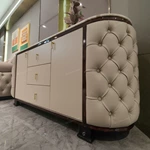 Oval Marble-Top Sideboard with Deep Button-Tufted Leather Panels and High-Gloss Lacquer Frame